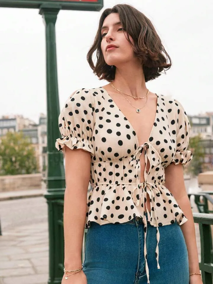 Polka dot print tie front ruffle hem blouse